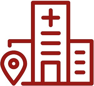 Rotes Piktogramm mit einem Gebäude mit Kreuz, einem Standort-Pin und einem weiteren Gebäude mit Linien als Fenster